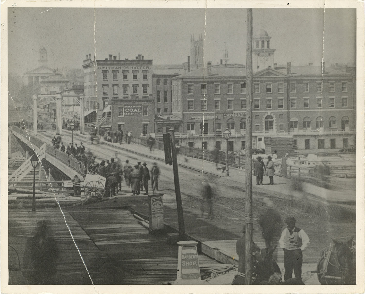 Image dated 1836 of the Market House building along First Street in Oswego, NY.
