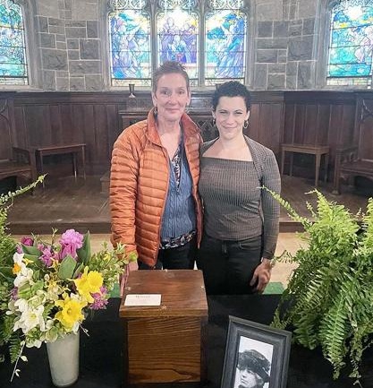 Kathy Wade and Hannah Speregan are pictured with the cremated remains of Kate Gary Richardson in Page Memorial Chapel at Riverside Cemetery - Photo provided by Natalie J. Woodall