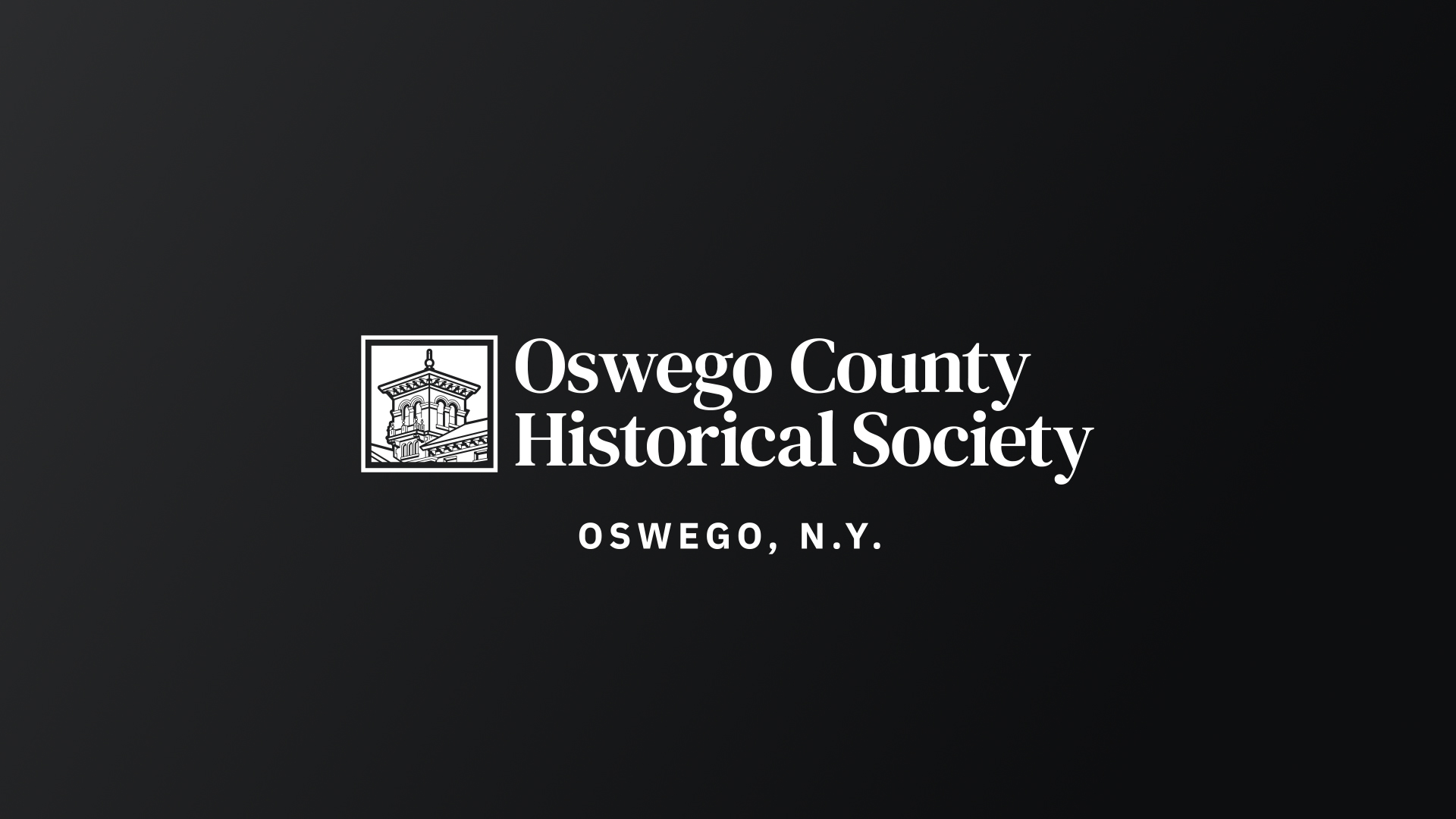 The Oswego County Historical Society logo, in white, on a black gradient background.